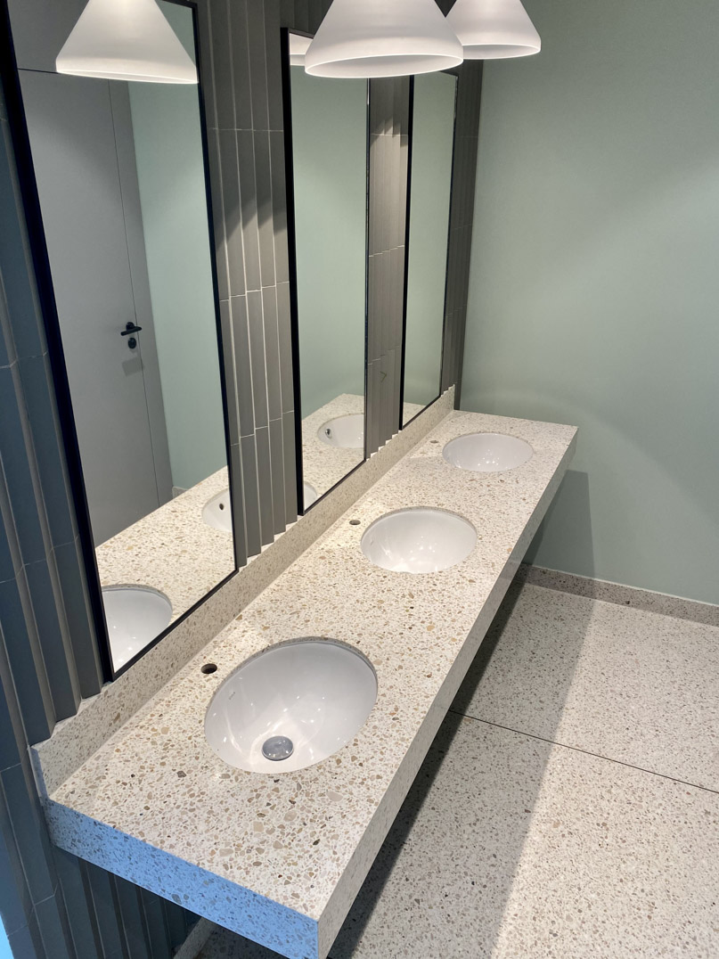 office bathroom with terrazzo