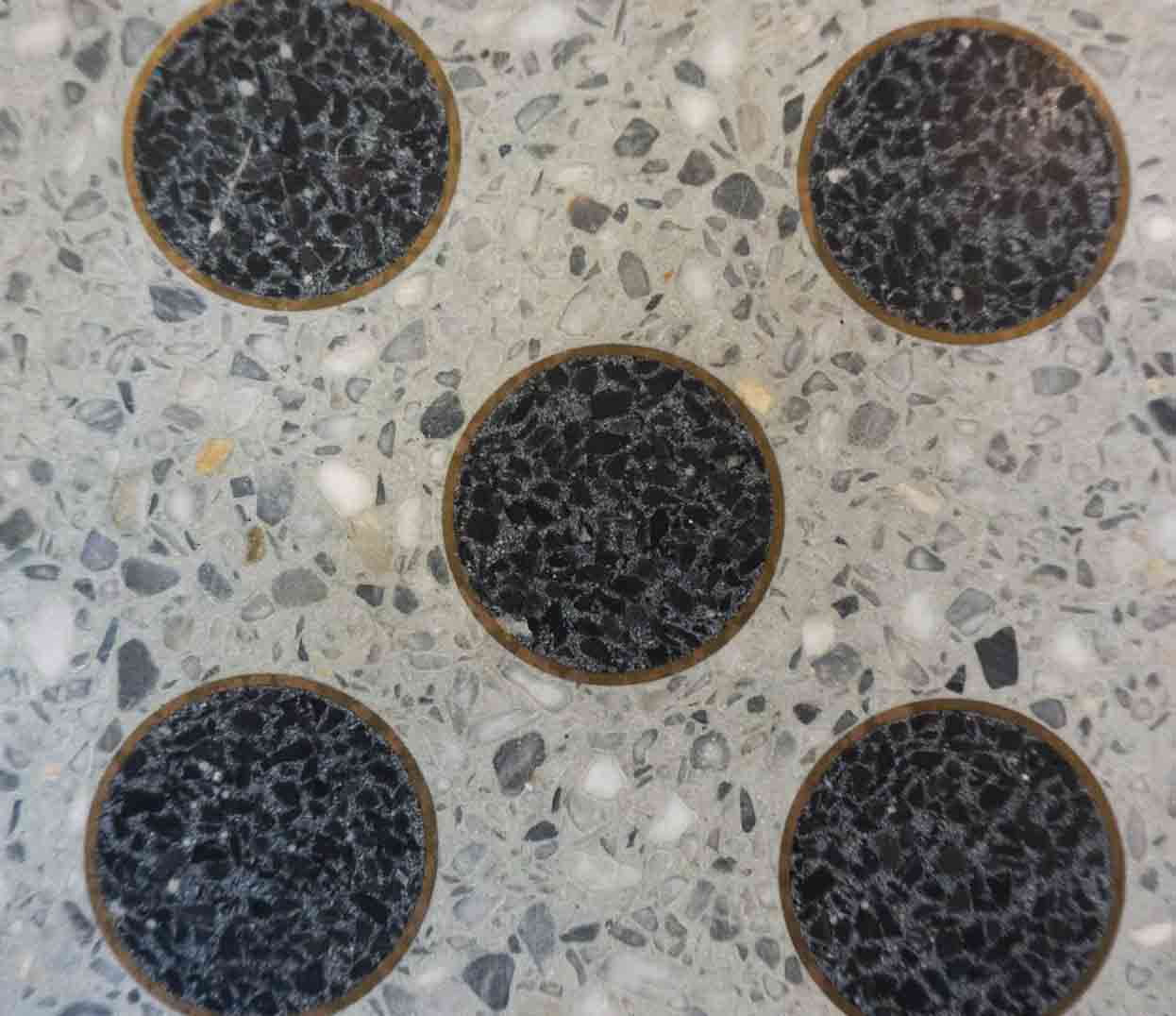 black-terrazzo-in-brass-rings
